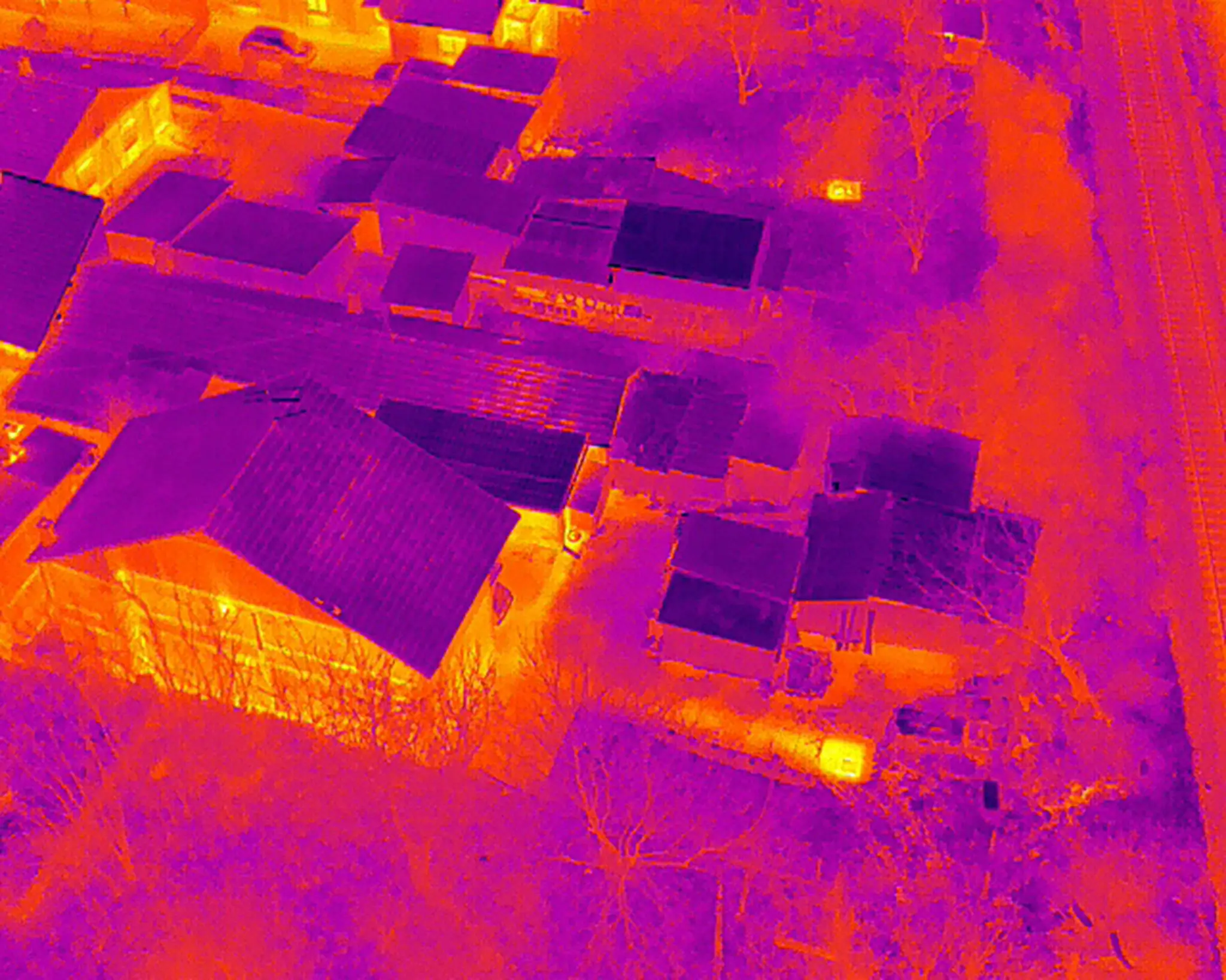 Infrared image depicting rooftop heat signatures.