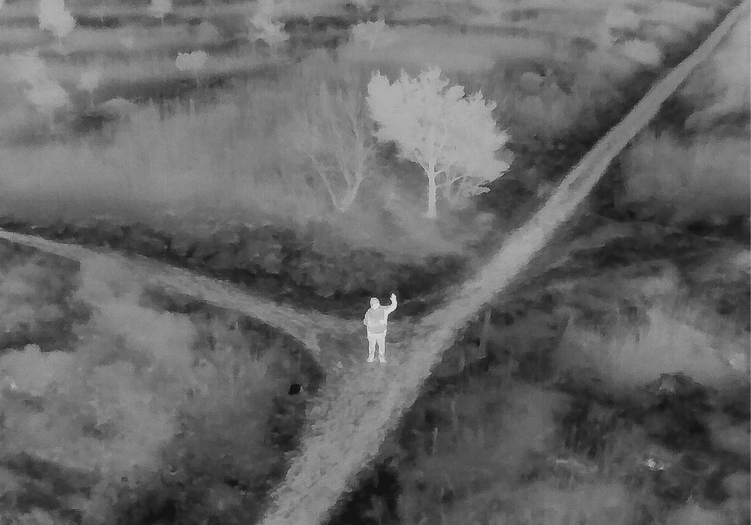 Thermal image of person at crossroads