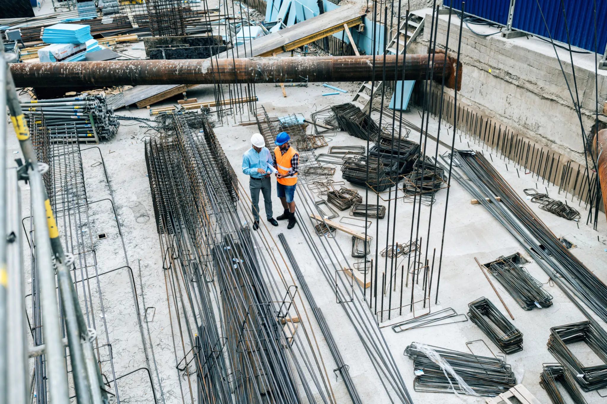 Engineers examining construction progress